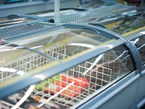 Close-up of a commercial refrigerator. Possible commercial refrigerator power surge risk evident.